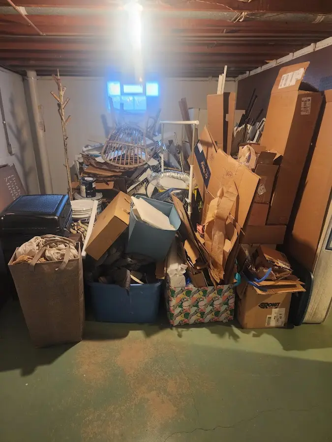 Roll-off dumpster container at job site for 8 Yard Dumpster Rental in Parma